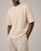 The Comfort Fit in Mother of Pearl — oversized Suvin cotton t-shirt on model, front view.