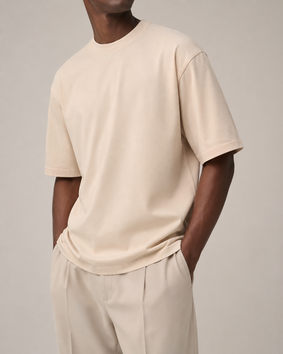 The Comfort Fit in Mother of Pearl — oversized Suvin cotton t-shirt on model, front view.