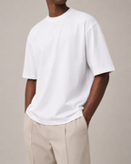 The Comfort Fit in White — oversized Suvin cotton t-shirt on model, front view.