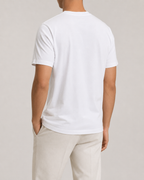 The Standard Fit in White — classic-fit Suvin cotton t-shirt on model, back view.