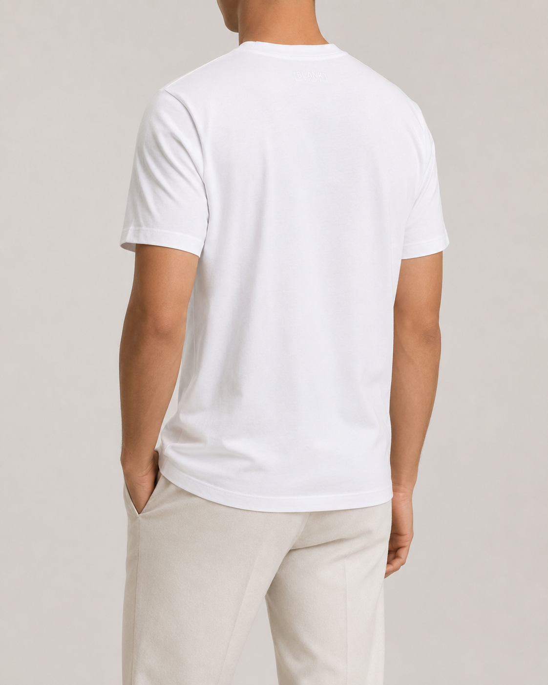 The Standard Fit in White — classic-fit Suvin cotton t-shirt on model, back view.