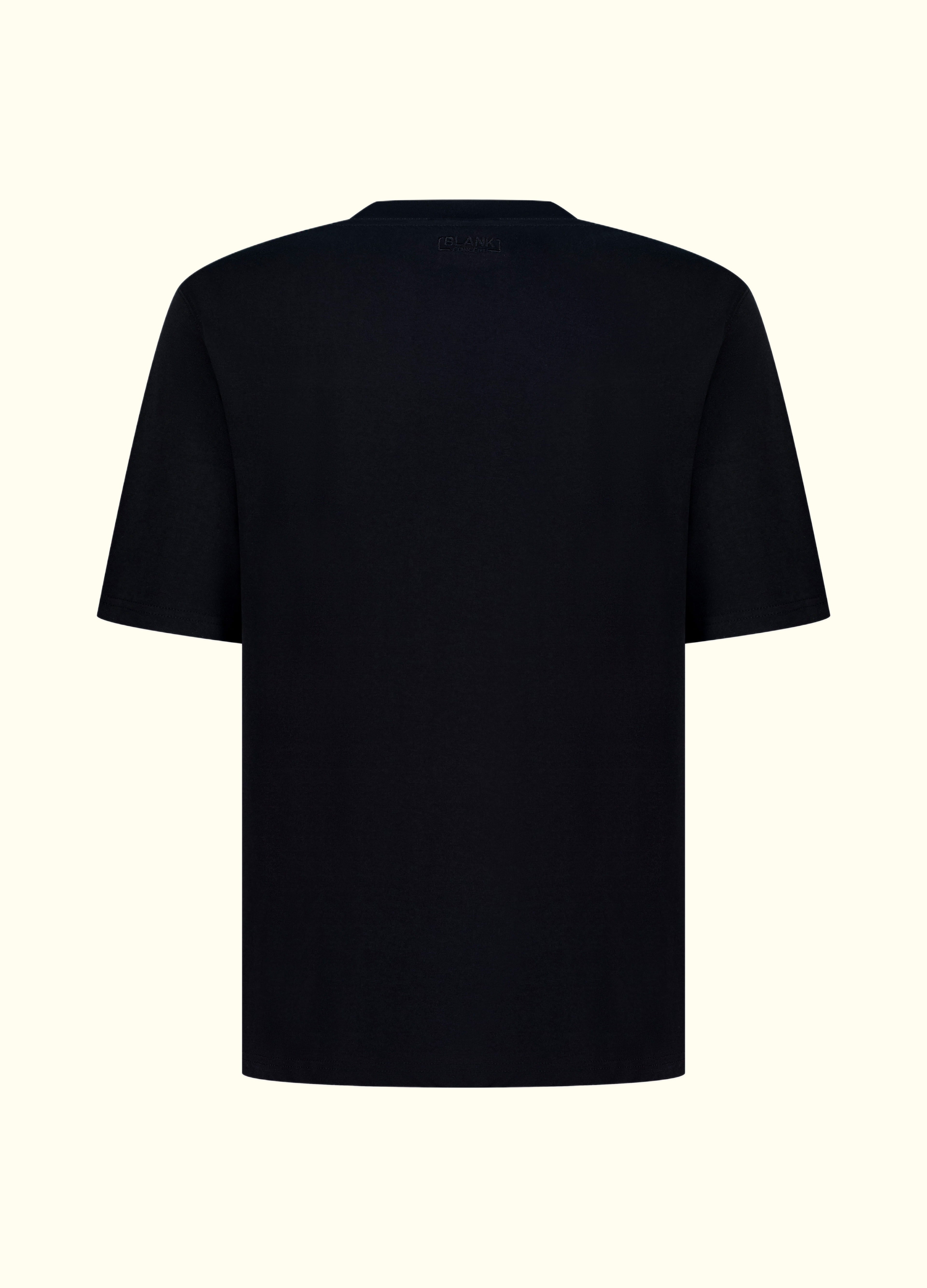 The Comfort Fit in Black — oversized Suvin cotton t-shirt, back view.