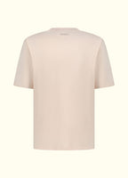 The Comfort Fit in Mother of Pearl — oversized Suvin cotton t-shirt, back view.