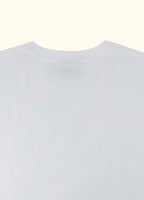 The Standard Fit in White — close-up of the Suvin cotton fabric.