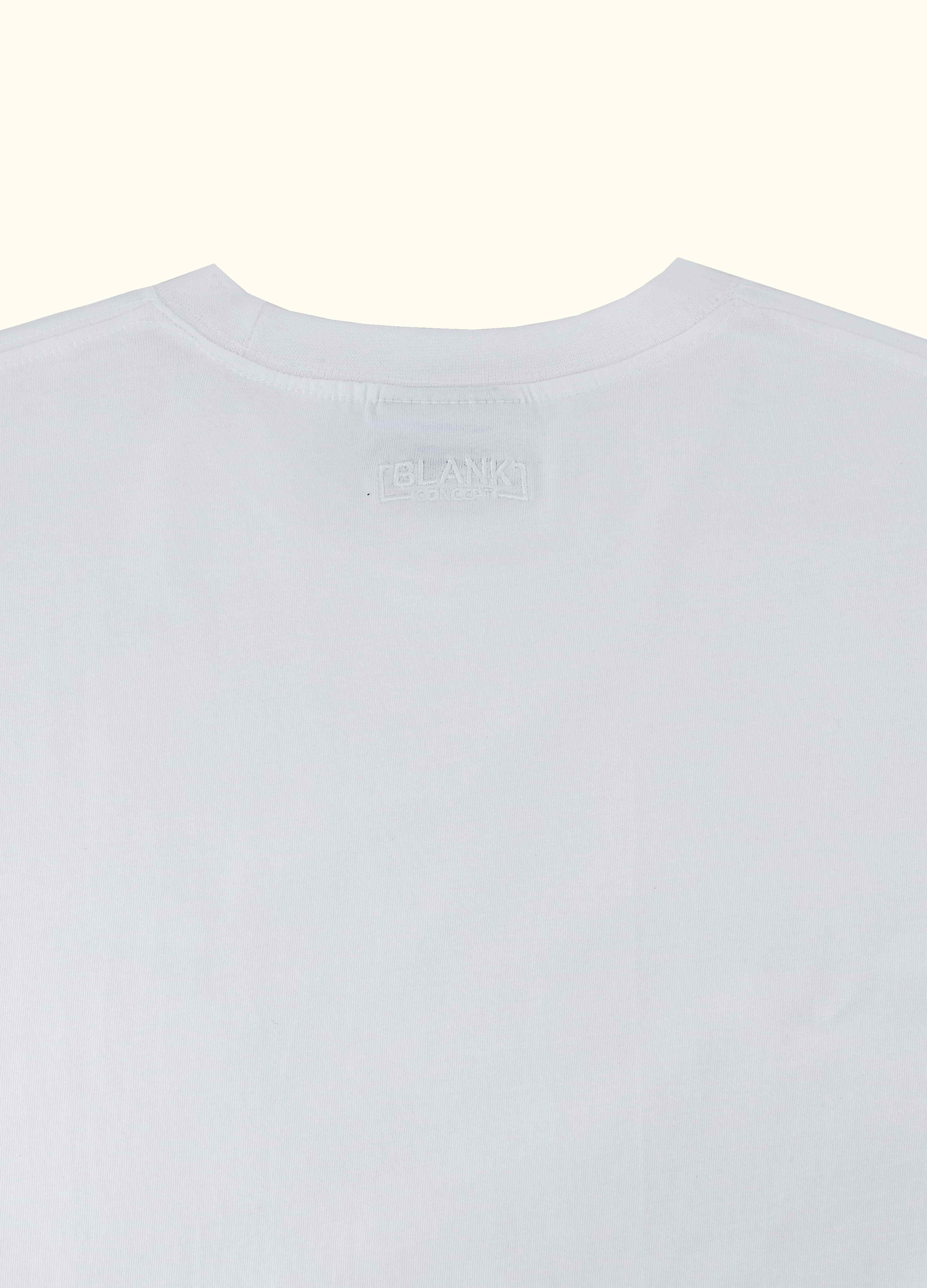 The Standard Fit in White — close-up of the Suvin cotton fabric.